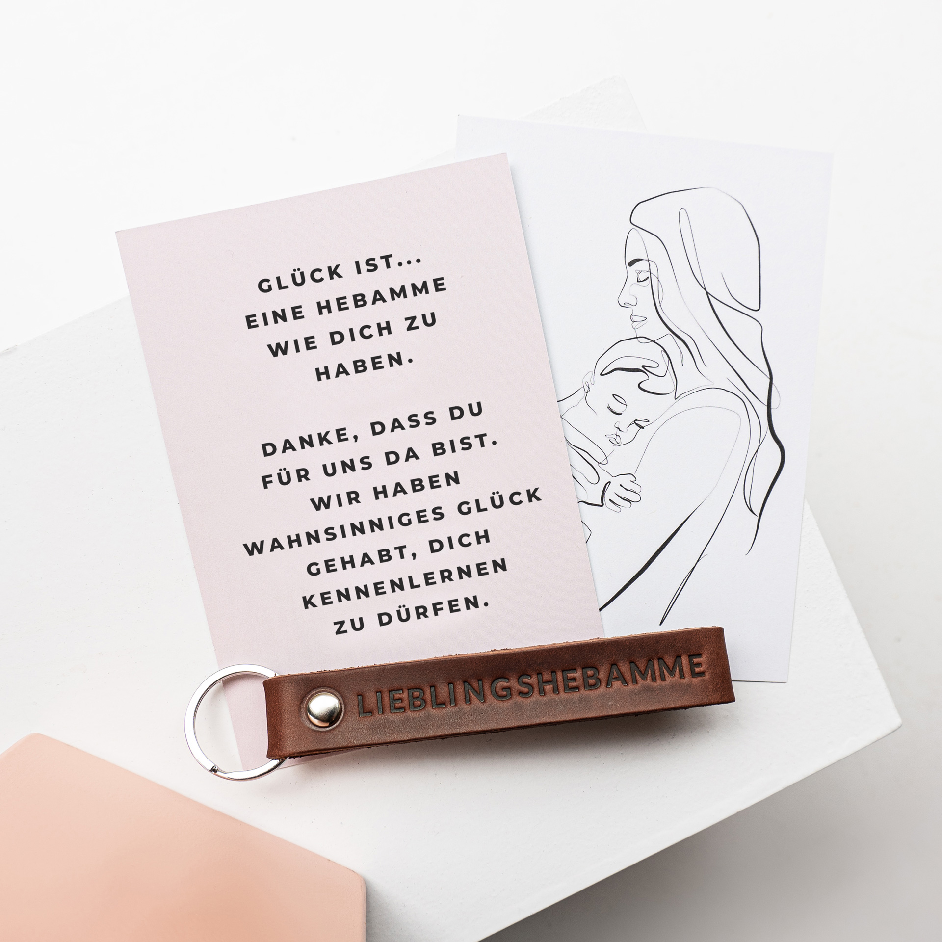 Schlüsselband LOC in der Farbe Dunkelbraun mit der Prägung 