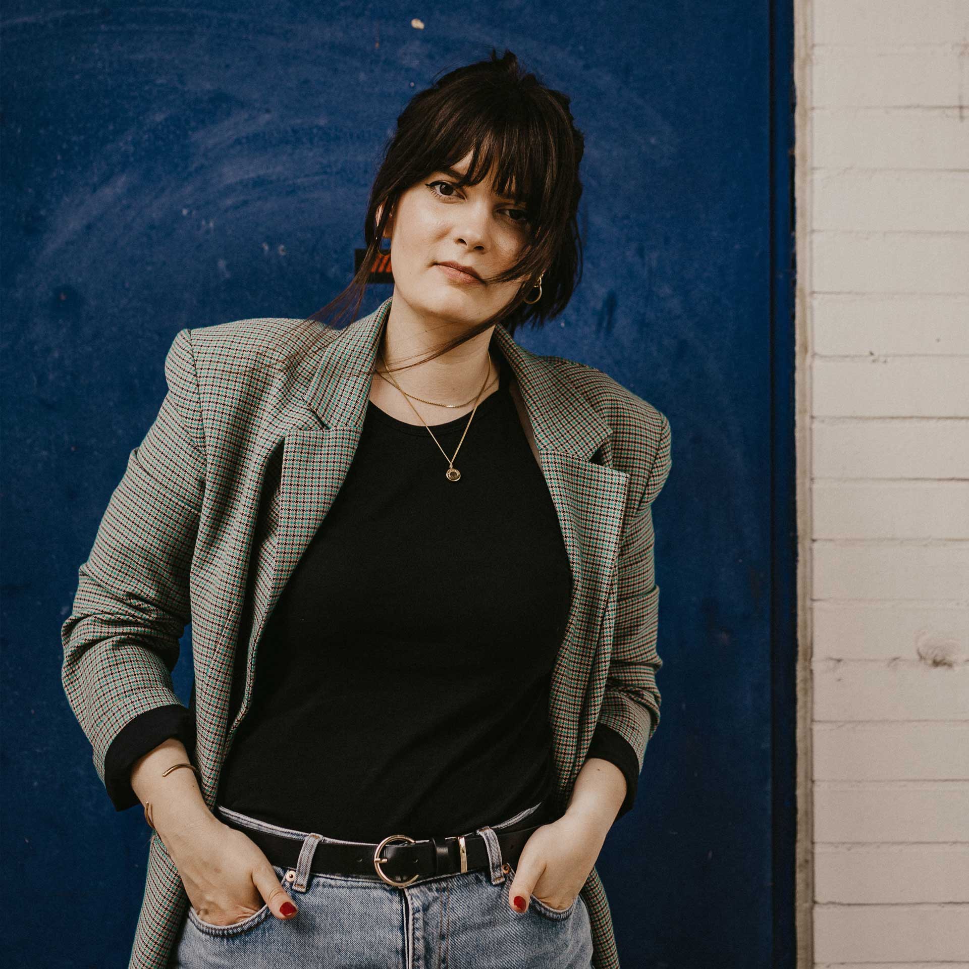 Das Logo der Grafikdesignerin Mona Wingerter.